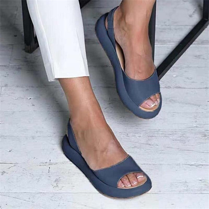 Casual blue open toe sandals for women, featuring a comfortable cushion sole; great summer footwear.