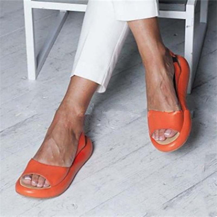 White women's open toe sandals, comfortable cushion sole, versatile for everyday summer wear.