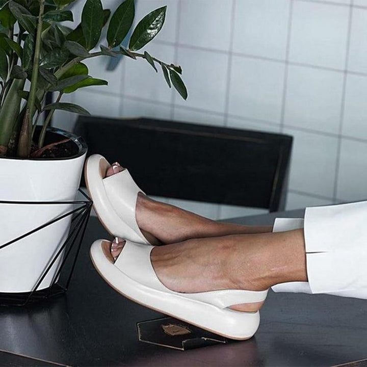 Comfortable women's open toe sandals, cushion sole for walking, available in various summer colors.