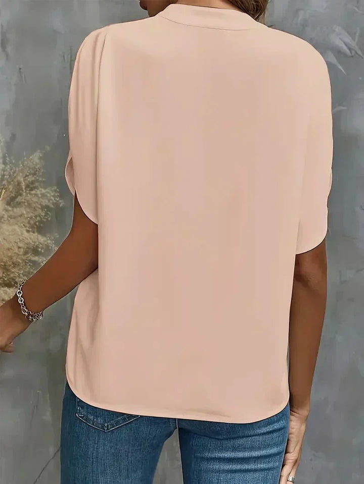 Versatile women's V-neck t-shirt with unique split sleeves, perfect for casual elegant style.
