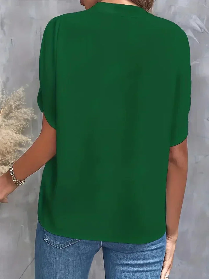 Stylish women's V-neck t-shirt, featuring unique split sleeves for an effortlessly modern aesthetic.
