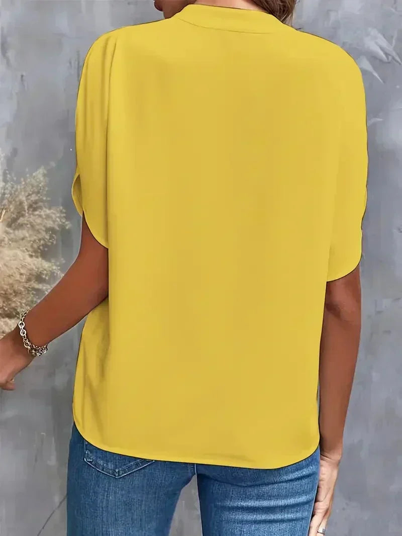 Women's elegant V-neck t-shirt, featuring a contemporary split sleeve design, ideal for summer.