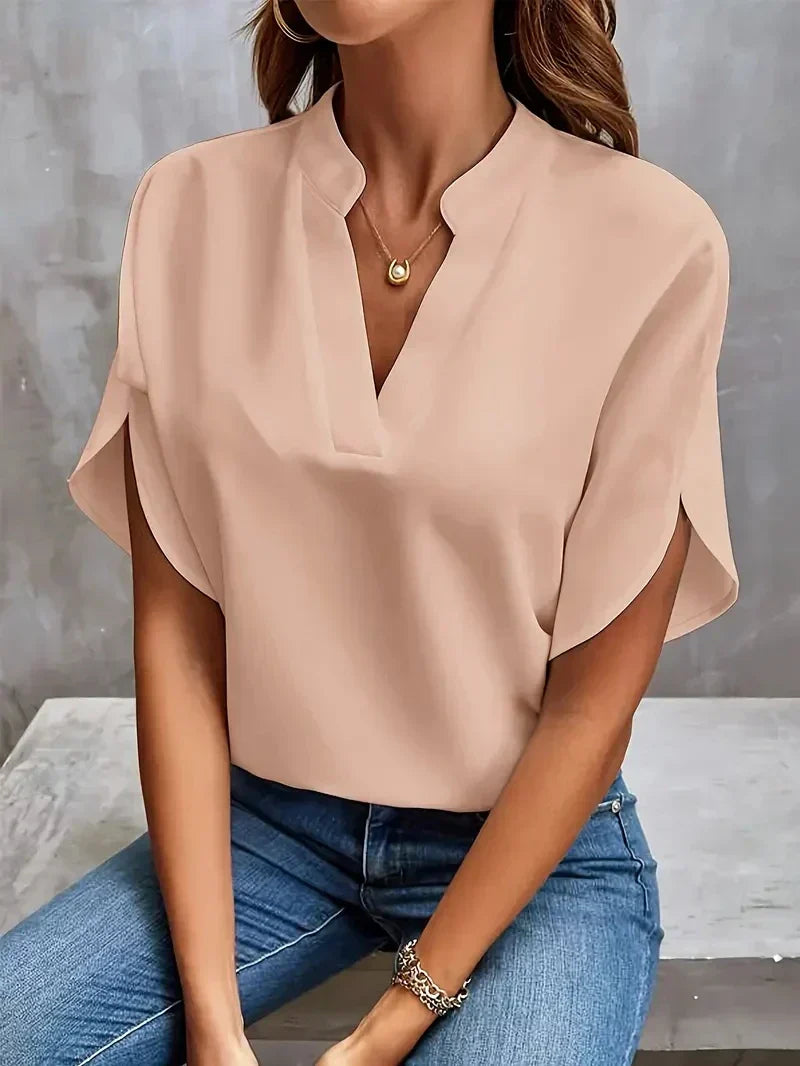 Modern women's V-neck top with fashionable split short sleeves, a comfortable and chic blouse.