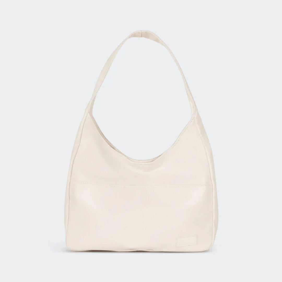 Classic vintage vegan leather shoulder bag. Stylish women's purse, also convertible to a crossbody bag.