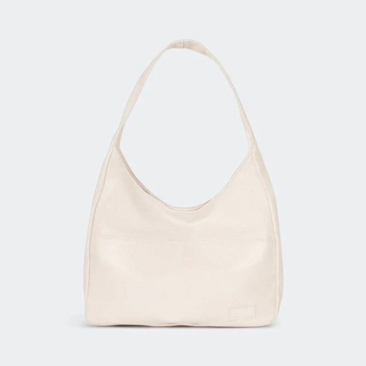 Classic vintage vegan leather shoulder bag. Stylish women's purse, also convertible to a crossbody bag.