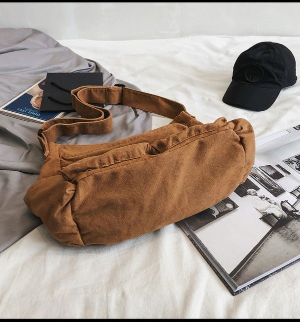 Versatile camel canvas women's tote bag, oversized for travel, work, or daily essentials.