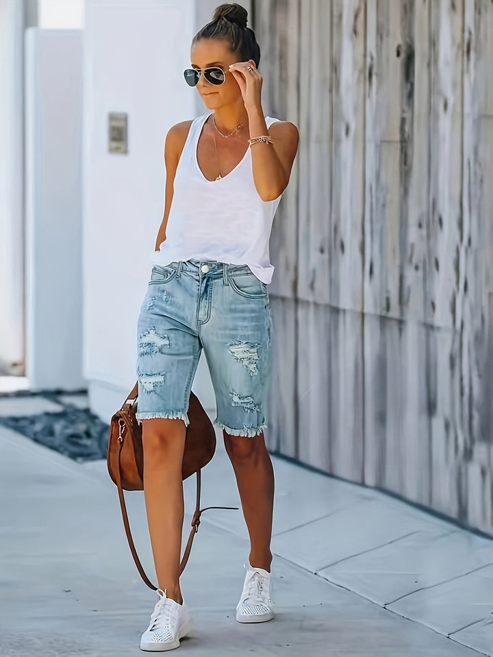 Women's elegant denim shorts, perfect for all-season comfort. Versatile casual wear & everyday style.
