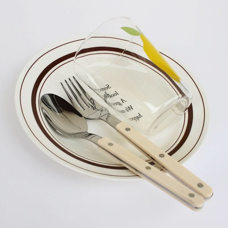 Complete 24-piece engraved stainless steel dining flatware set with utensils for elegant meals.