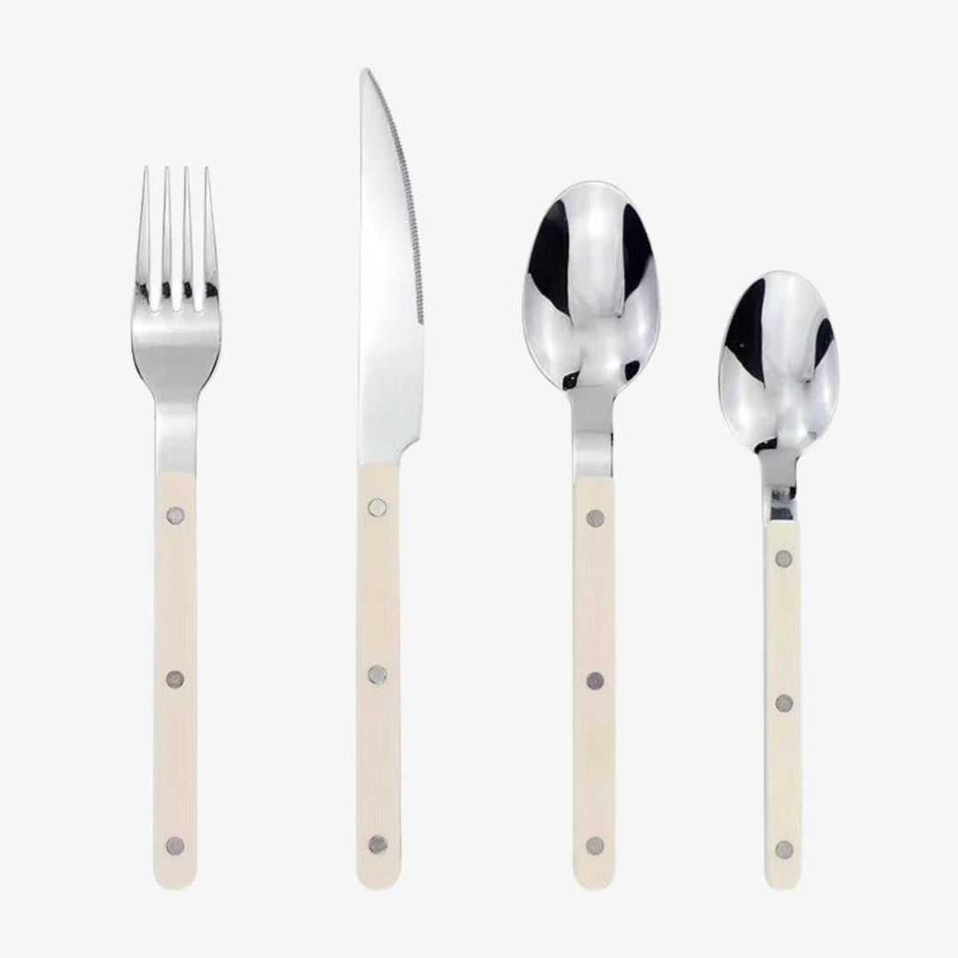 Modern 24-piece engraved stainless steel cutlery set. Elegant flatware & dinnerware for stylish home decor.