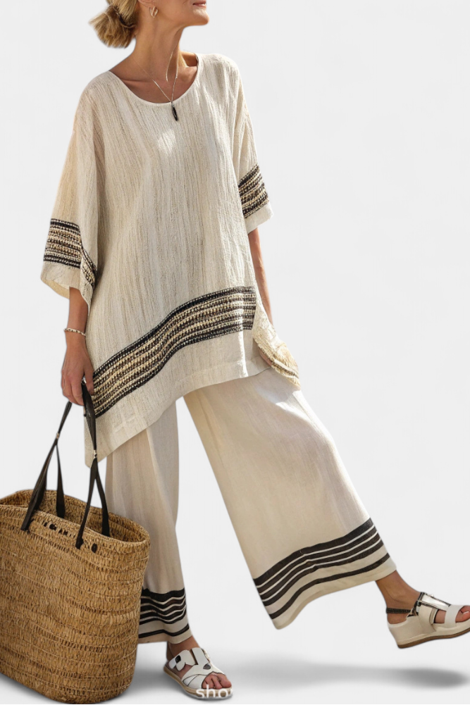 Versatile women's black-striped relaxed fit top & pants outfit, perfect for warm weather and chic summer.