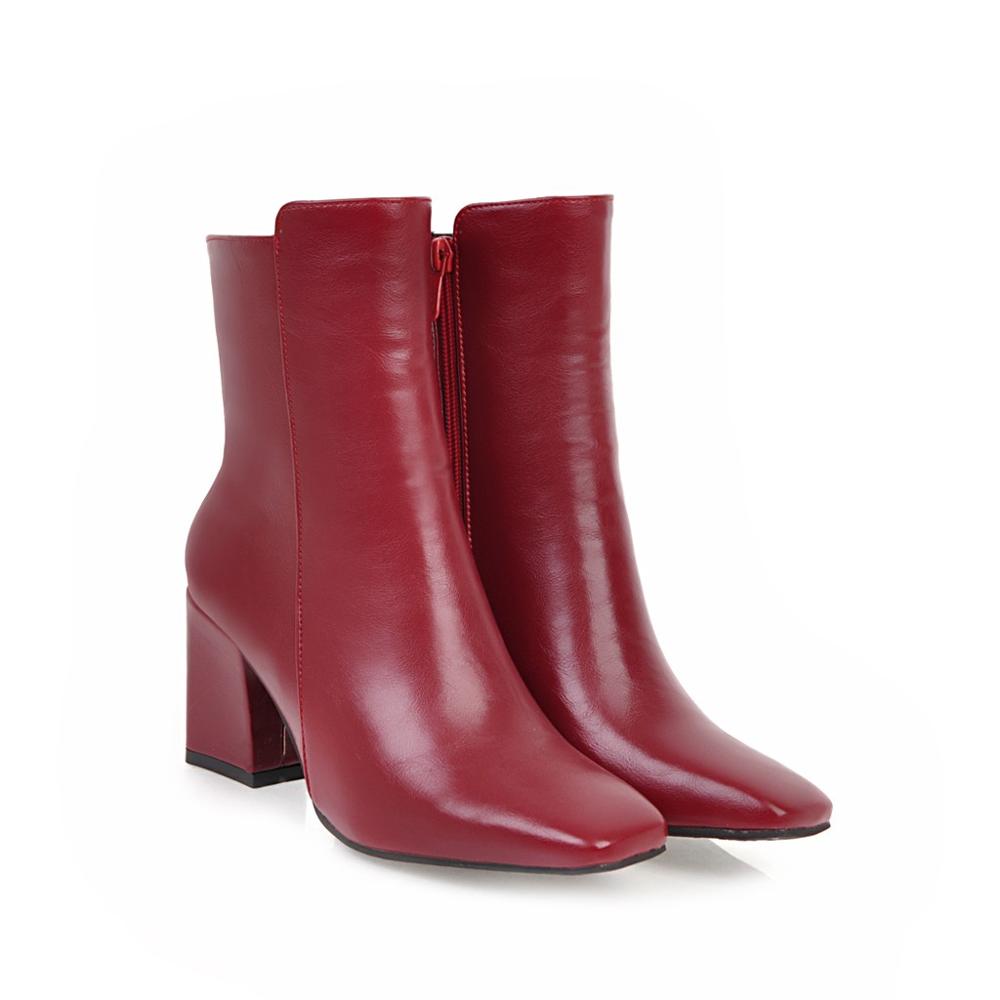 Elegant women's black high heel ankle boots for a sophisticated style, perfect dressy footwear for any occasion.