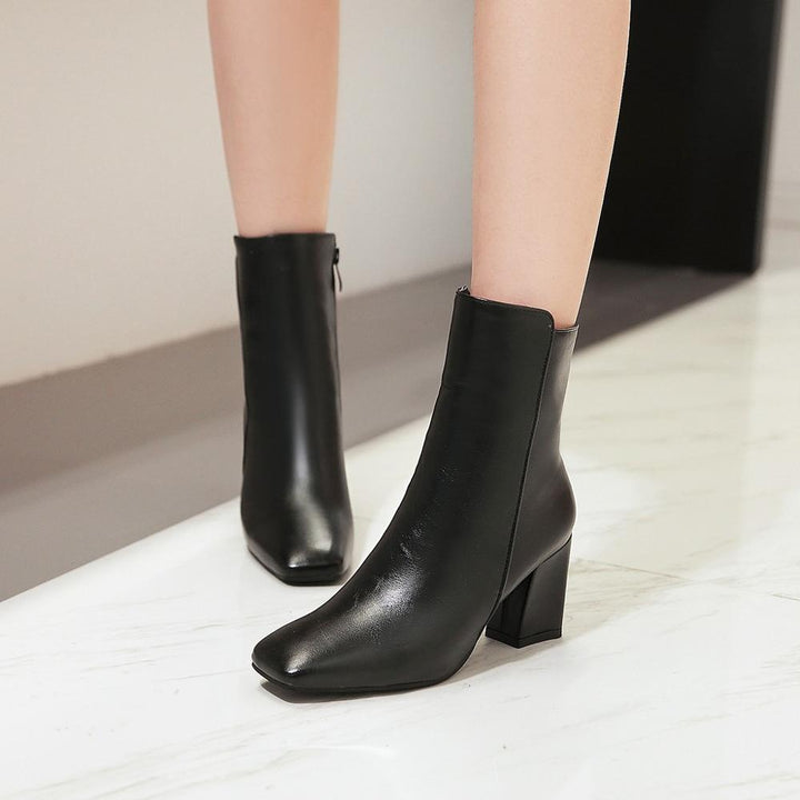 Stylish women's high heel ankle boots, sleek and versatile for fashion-forward outfits and sophisticated looks.