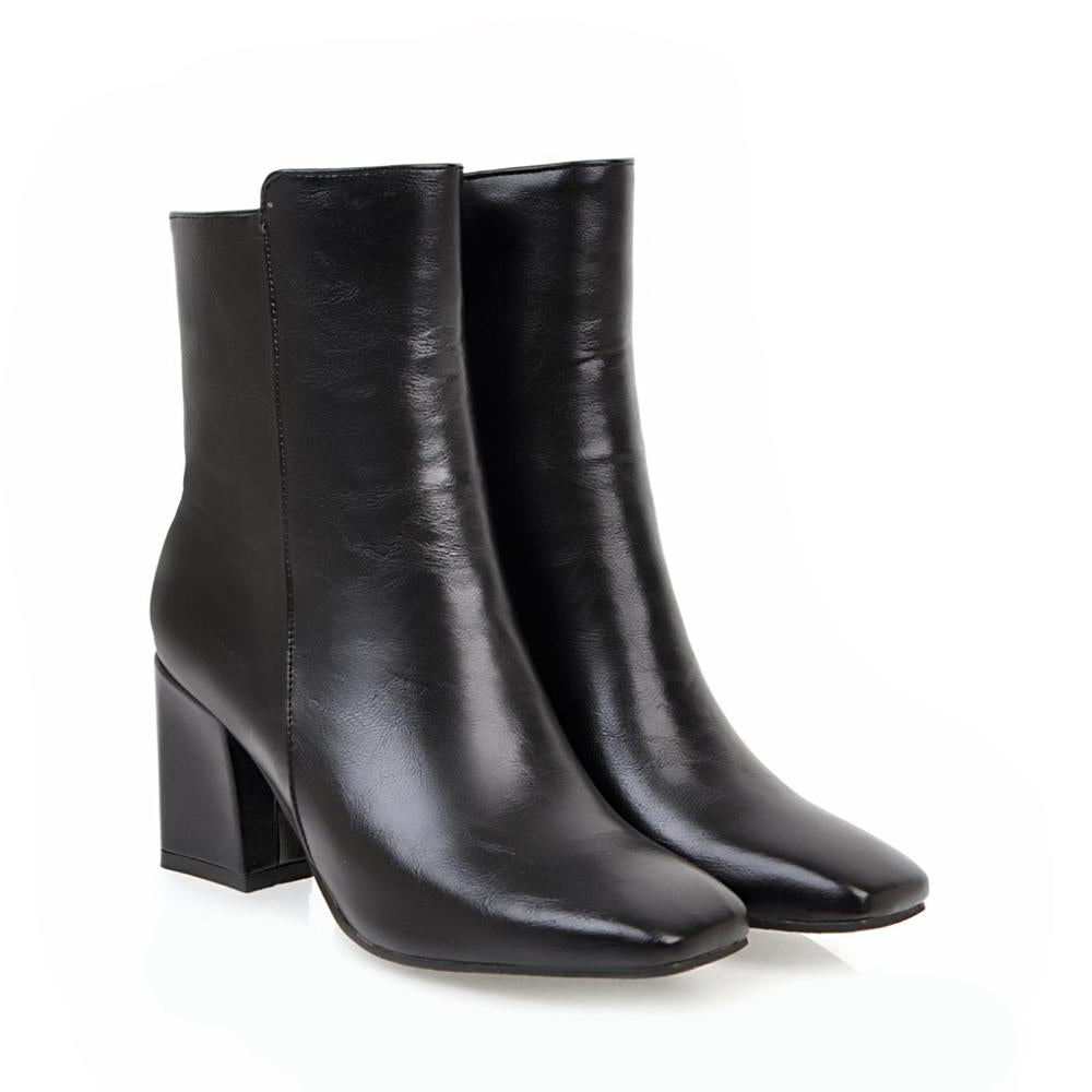 Sleek women's elegant ankle boots with high heels, perfect for a sophisticated, stylish and fashionable footwear statement.