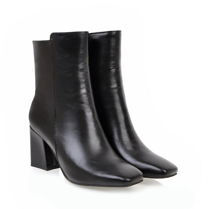 Sleek women's elegant ankle boots with high heels, perfect for a sophisticated, stylish and fashionable footwear statement.