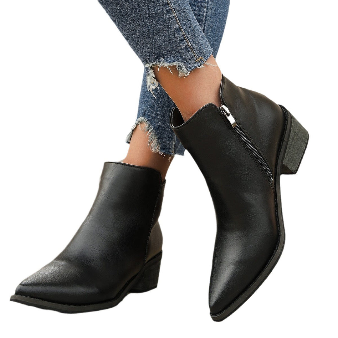 Comfortable women's block heel ankle boots with elegant pointed toe. Perfect chic footwear for winter.