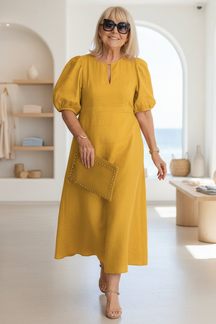 Versatile women's elegant formal maxi dress, suitable as an evening gown or cocktail dress.