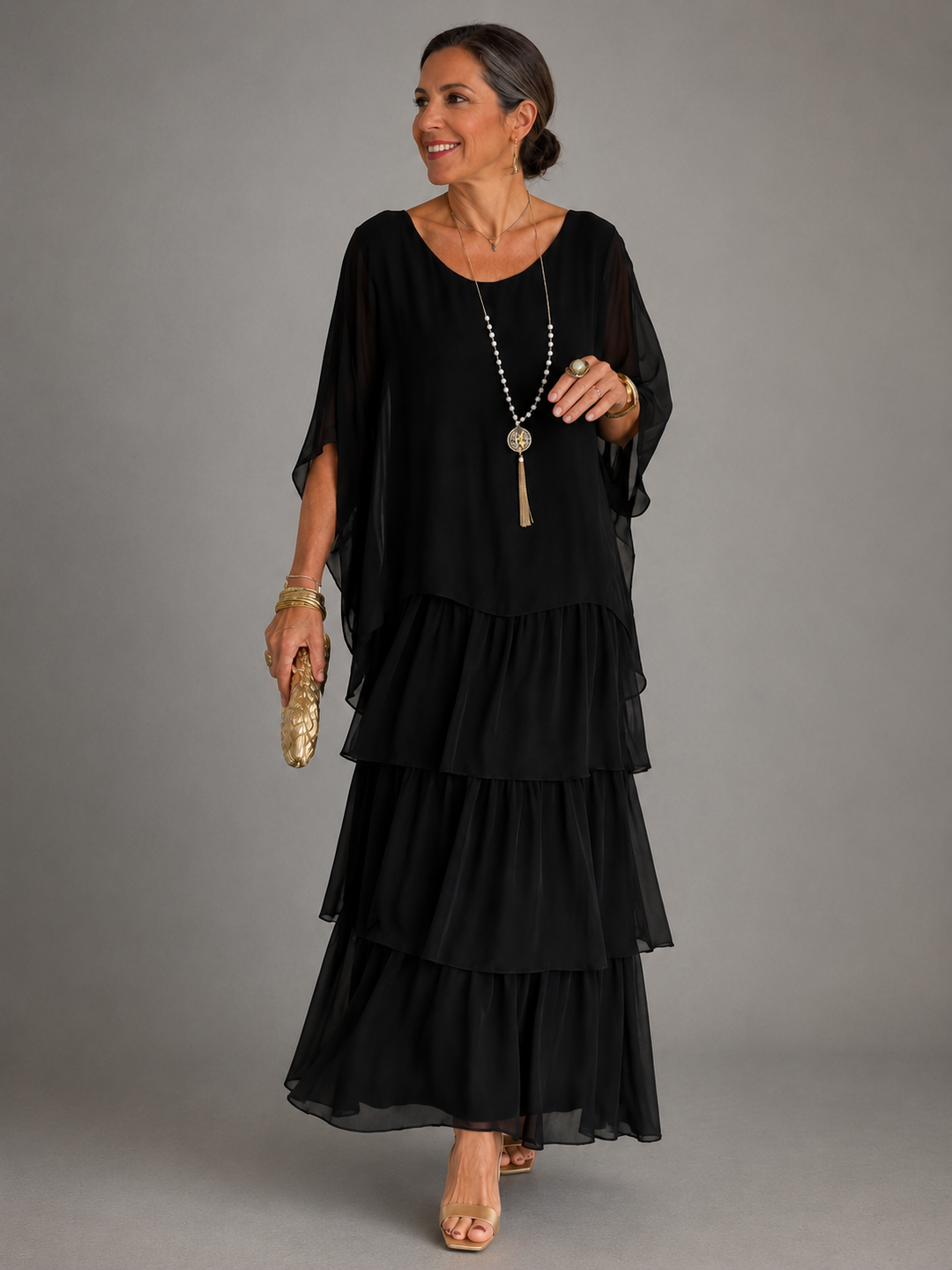 Women's flowy tiered maxi dress with long sleeves & ruffle trim, perfect for fall casual elegance.