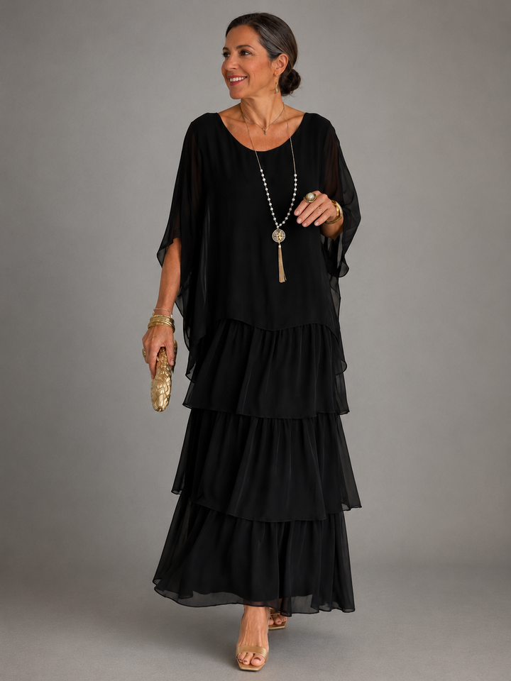 Women's flowy tiered maxi dress with long sleeves & ruffle trim, perfect for fall casual elegance.