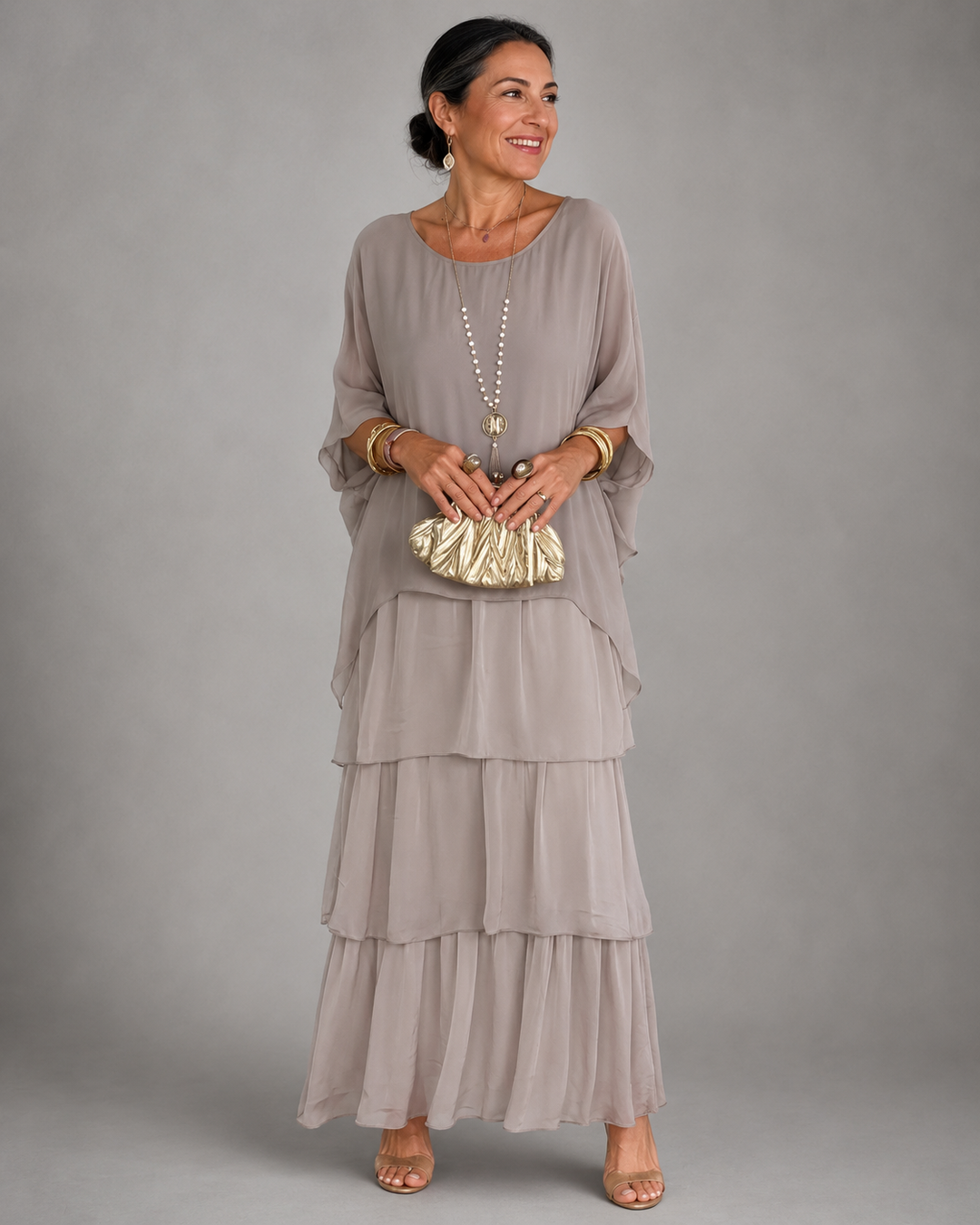 Comfortable women's long sleeve maxi dress, featuring a flowy tiered skirt & delicate ruffle trim.