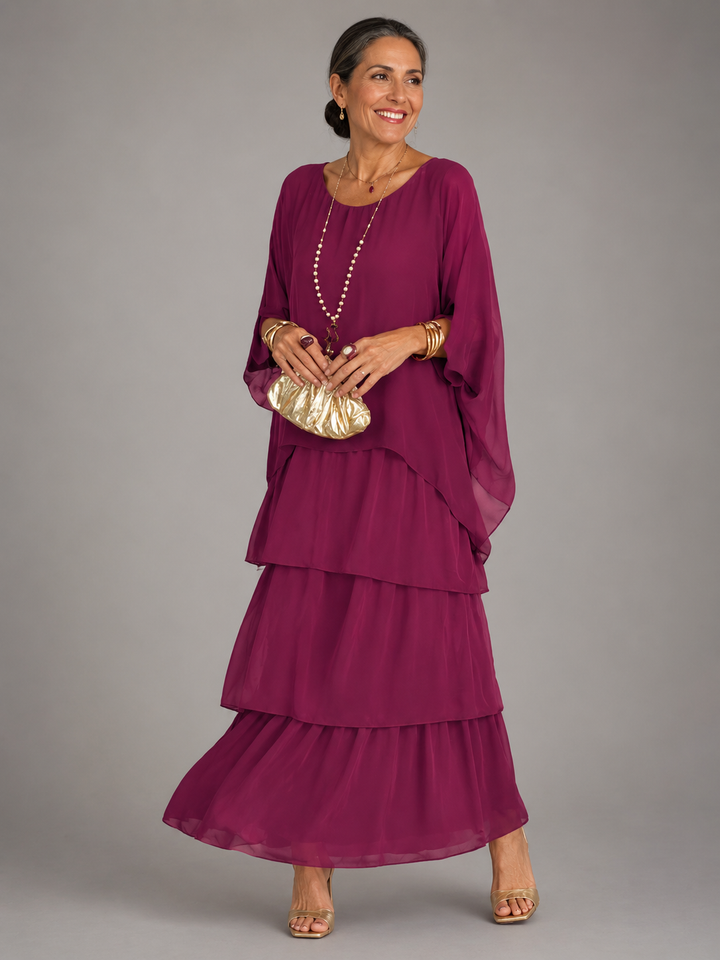 Elegant modest women's long sleeve maxi dress with ruffle trim, tiered skirt; ideal for travel or fall.