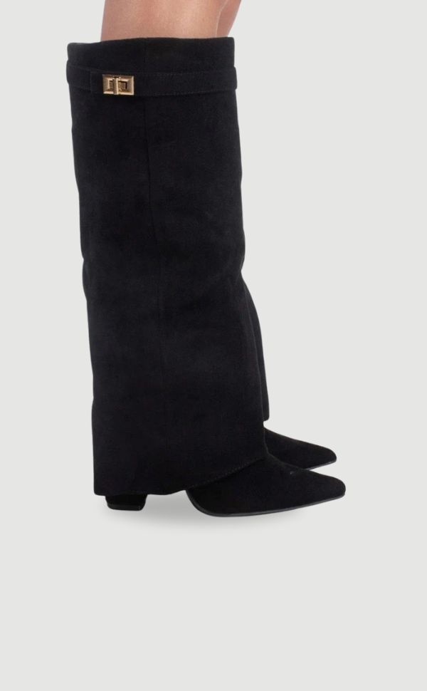 Tall women's over-the-knee boots. Sleek design, pointed toe, low heel. Chic fashion boots for confident strides.