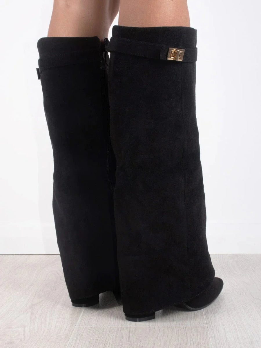 Fashionable women's over-the-knee boots. Tall, elegant with pointed toe & low heel for chic style.