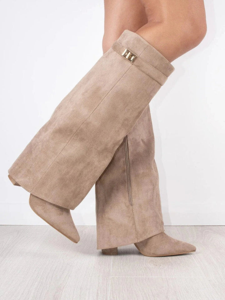 Long women's over-the-knee boots. Stylish & chic, pointed toe, comfortable low heel for confident fashion.