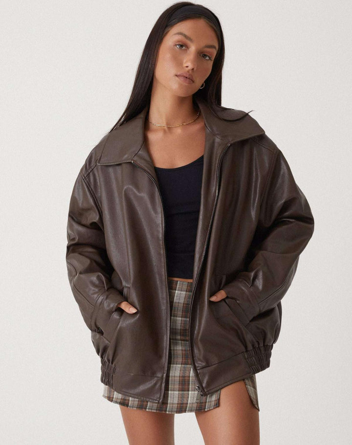 Women's classic black leather-look jacket with a chic, versatile design. Perfect for everyday fall fashion.