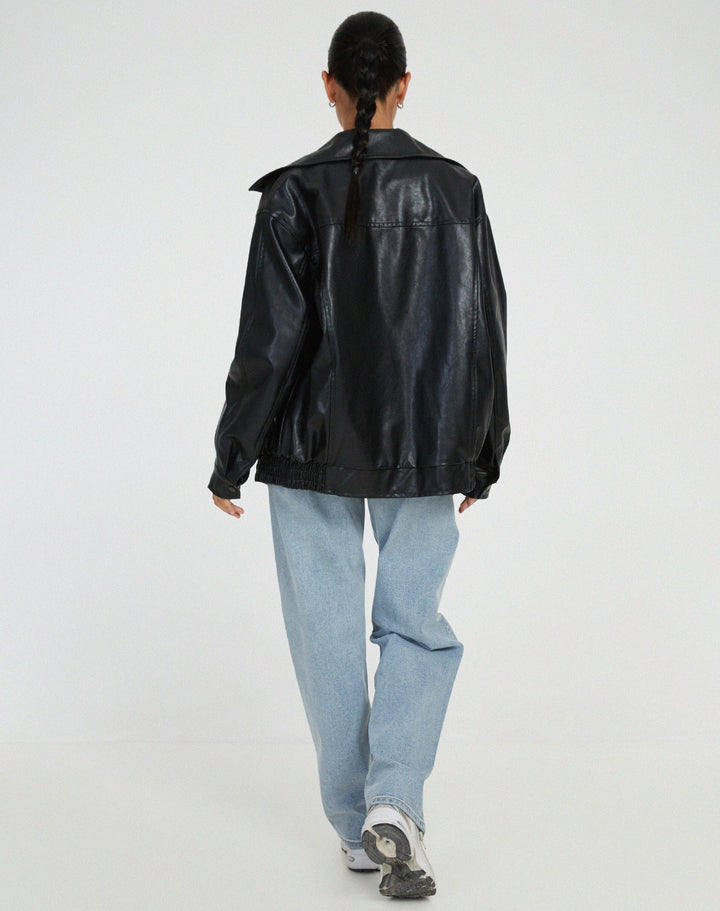 Smooth leather-look women's jacket in classic black, offering an effortlessly stylish and trendy appeal.
