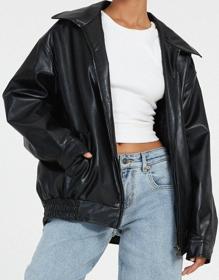 Chic women's leather-look jacket, a modern outerwear piece for versatile fall fashion and trendy styling.