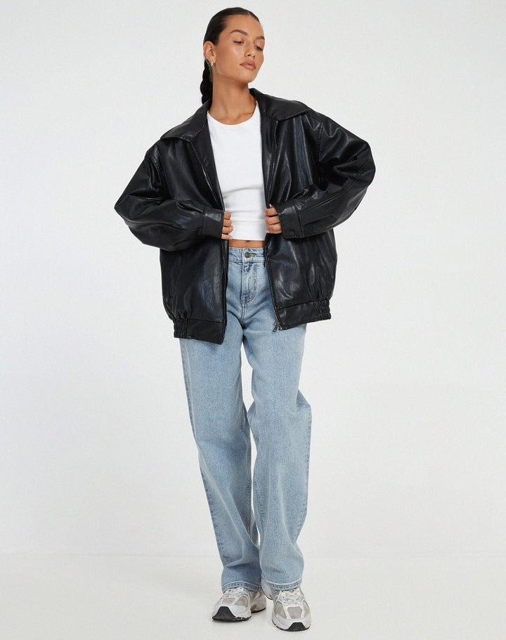 Women's classic black leather-look jacket, oversized and chic, perfect for versatile fall fashion.