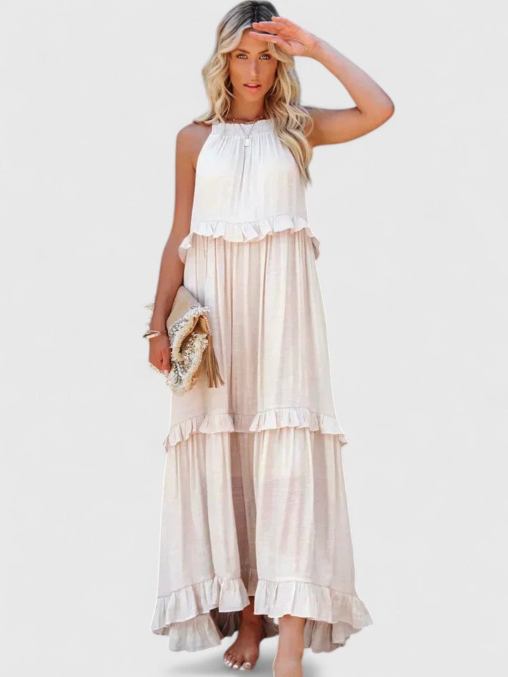 Elegant white flowy maxi dress for women, perfect for summer casual chic or party attire.