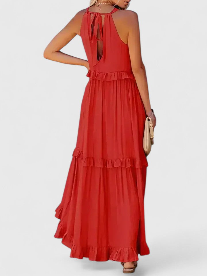 Full-length shot of an elegant white ruffle maxi dress, showcasing its flowy summer design.