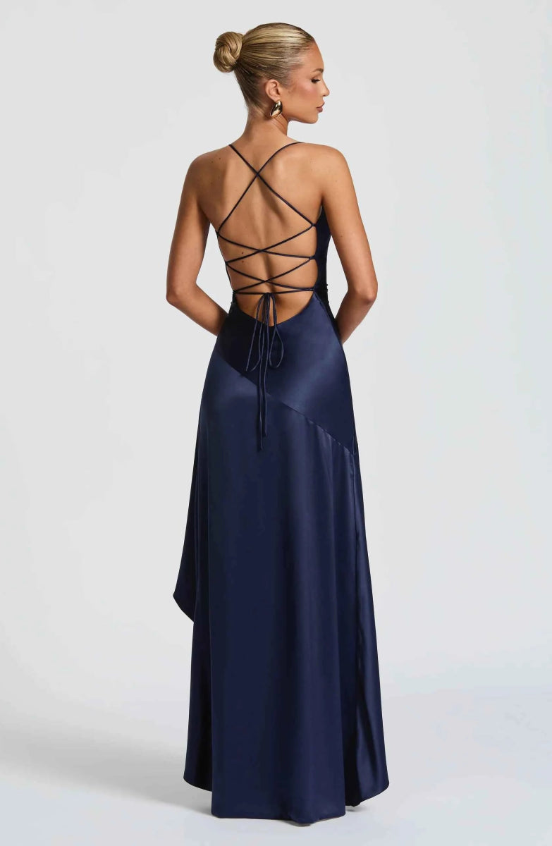 A-line sleeveless maxi dress with a dramatic ruffle trim and fashionable side split, for formal events.