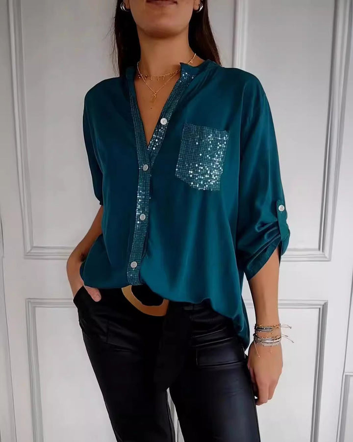 Women's versatile sequin blouse, elegant and glamorous top for chic fashion. Relaxed fit sparkle top.