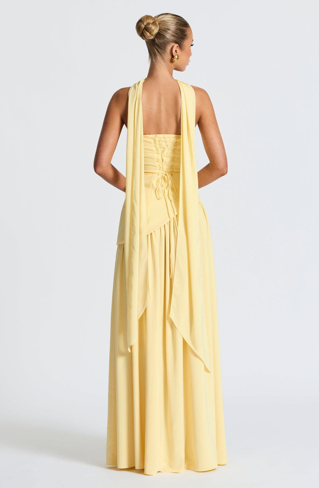 Stylish strapless maxi dress for women, featuring a flattering front slit, perfect for summer occasion wear.