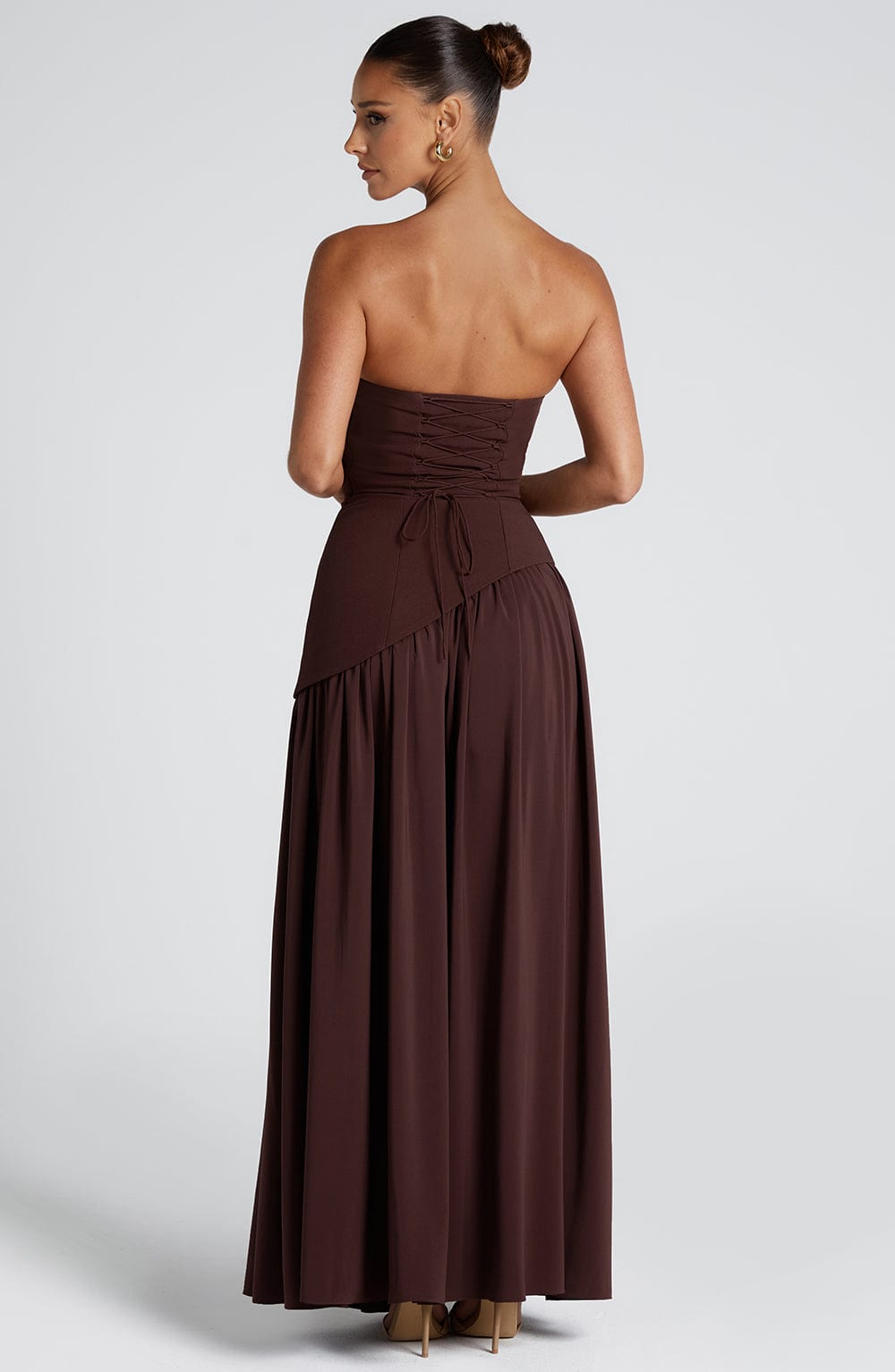 Lightweight & flowy women's strapless maxi dress with a front slit, ideal for elegant summer occasion wear.