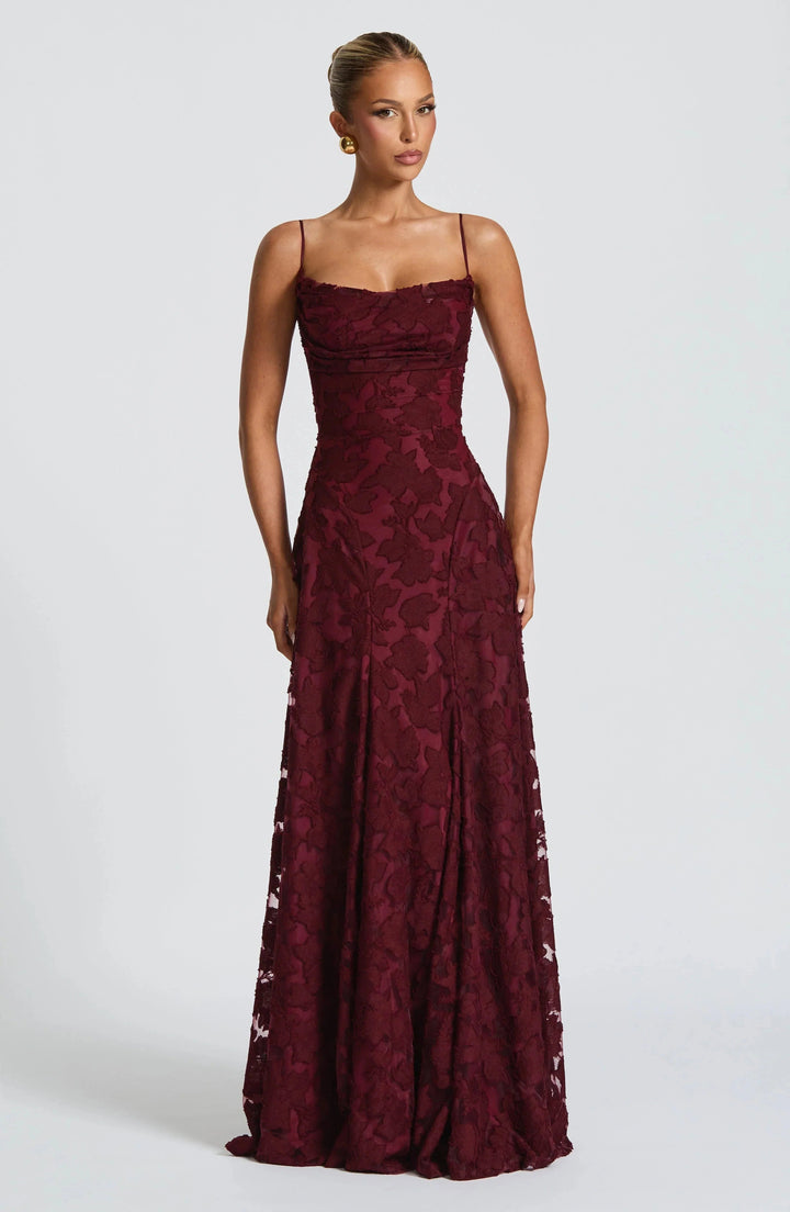 Elegant women's maxi dress with corset bodice & flowing skirt, perfect for formal evening occasions.