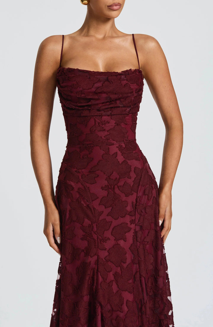Sophisticated women's occasion wear maxi dress with elegant corset and flowing skirt. Perfect evening gown.