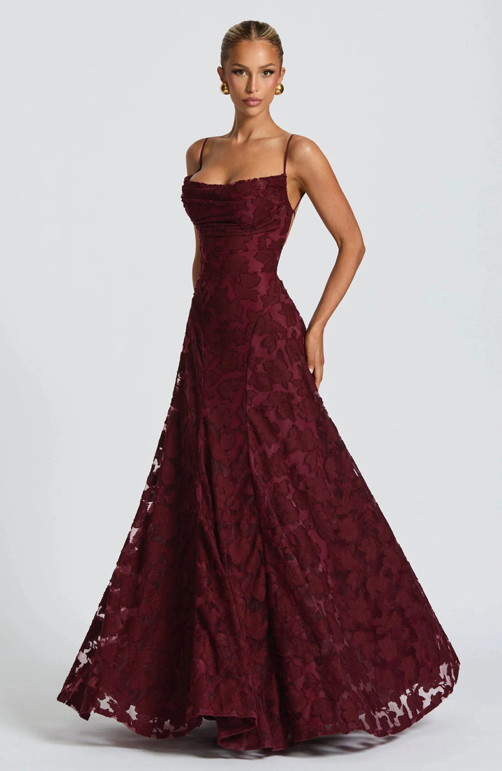 Flowing women's maxi dress with an elegant corset bodice & lace-up back. Ideal for formal events & parties.