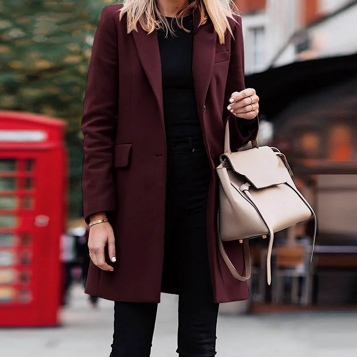 Stylish woman in an elegant, all-season trench blazer coat. Ideal for professional and business casual outfits.