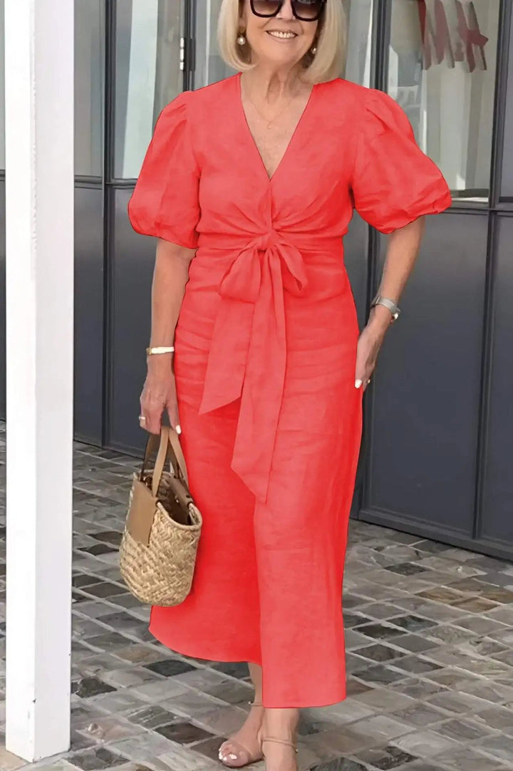 Elegant women's V-neck midi dress with puff sleeves, perfect for wedding guests & formal events.
