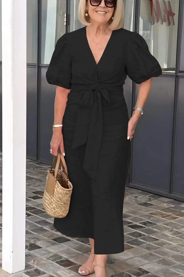 Women's elegant V-neck dress with chic puff sleeves, ideal for wedding guests & cocktail parties.