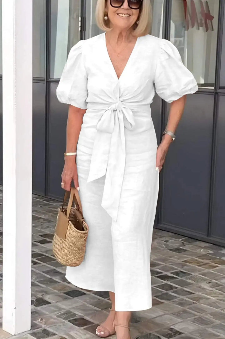 Versatile women's V-neck midi dress, a chic and elegant choice for various occasions and events.