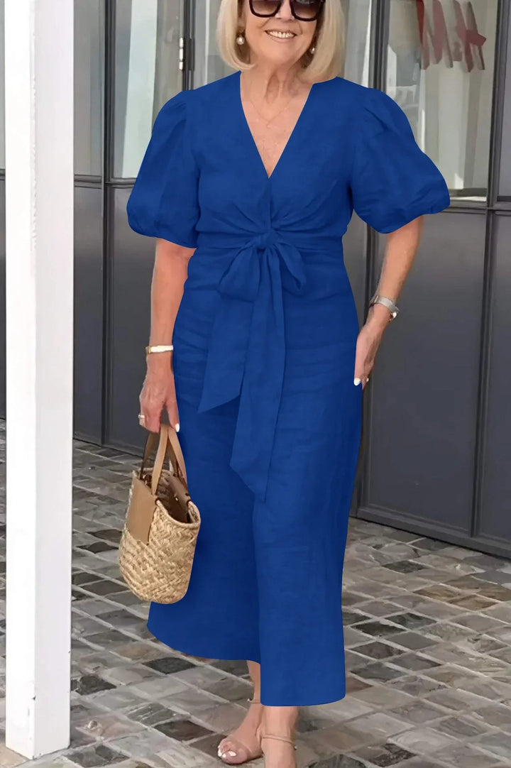 Classic yet modern women's elegant V-neck midi dress with puff sleeves for weddings & events.