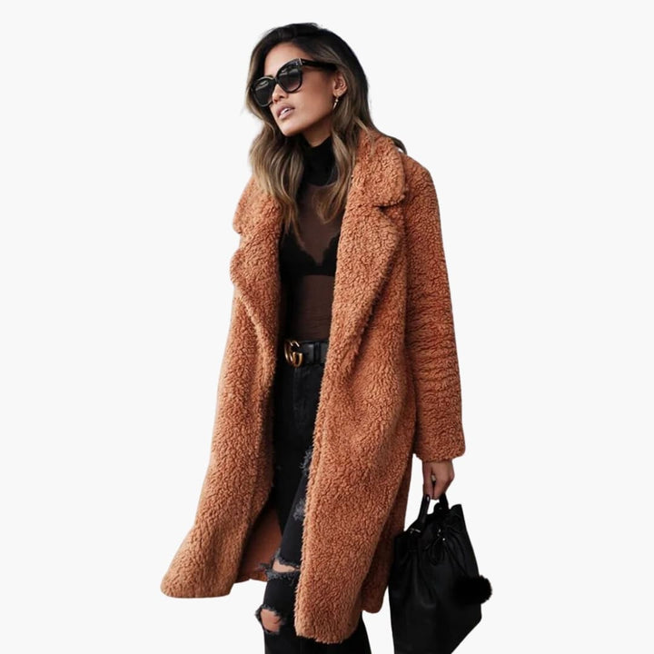 Fashionable women's long teddy coat with a chic wide collar, great for stylish layering.