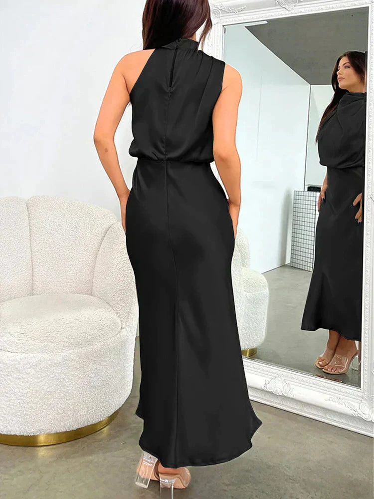 High-waist elegant women's midi dress featuring a halter neck and flattering silhouette.