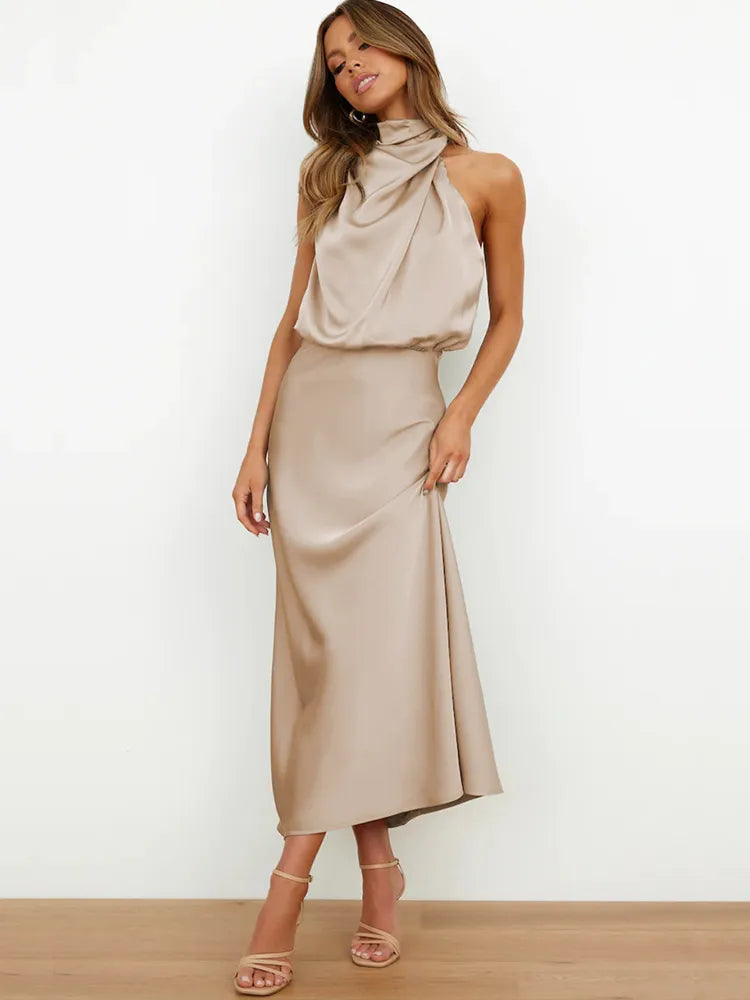 Stylish summer midi dress for women, halter neck design, perfect for warm weather events.