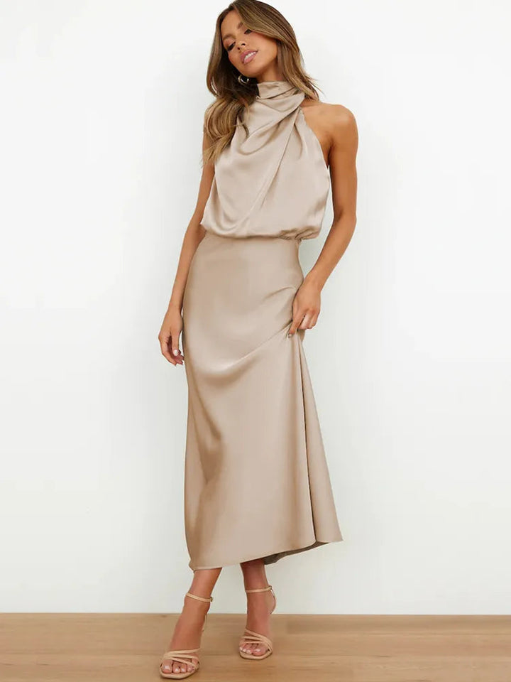 Stylish summer midi dress for women, halter neck design, perfect for warm weather events.