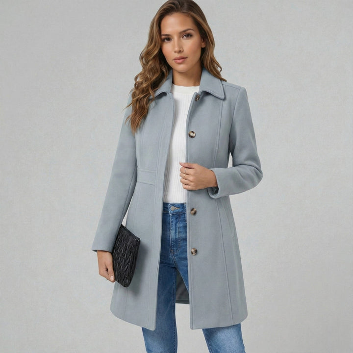 Versatile A-line long coat for women, elegant button closure, a staple for fall/winter classic fashion.